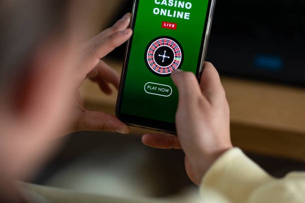 Live baccarat on fptoto mobile Mobile phone showing live baccarat table with dealer and betting interface